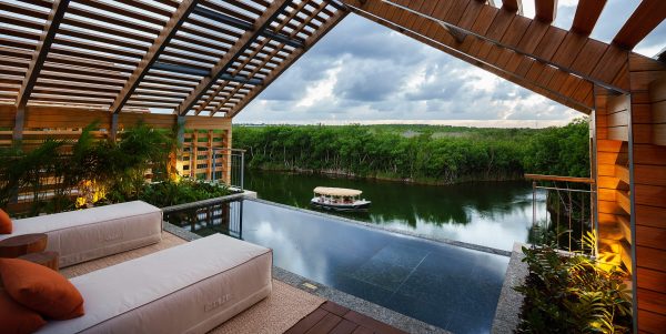 sun chairs with plunge pool on rooftop of villa