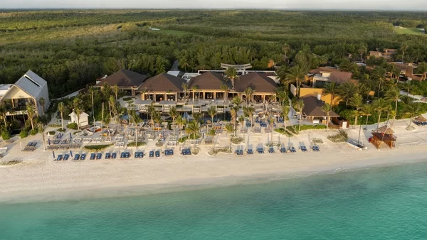 beach club sits on white-sand shoreline