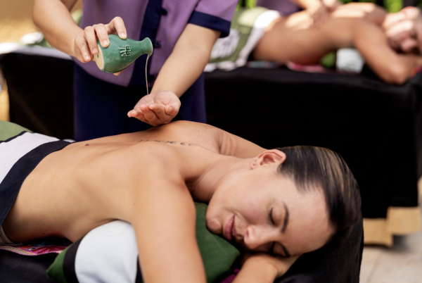 woman gets asian-inspired massage at banyan tree mayakoba