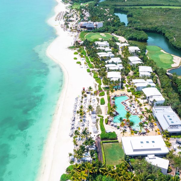 hotel sits along pristine beachfront with lush jungle landscape at andaz mayakoba