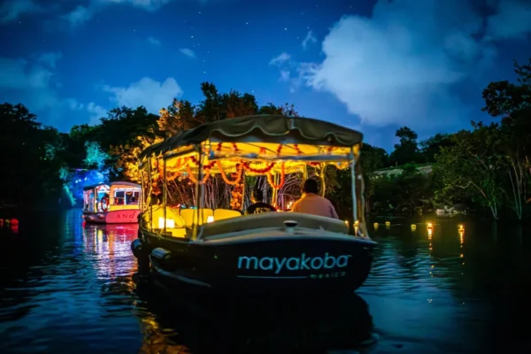 boats glide through mayakoba canals 