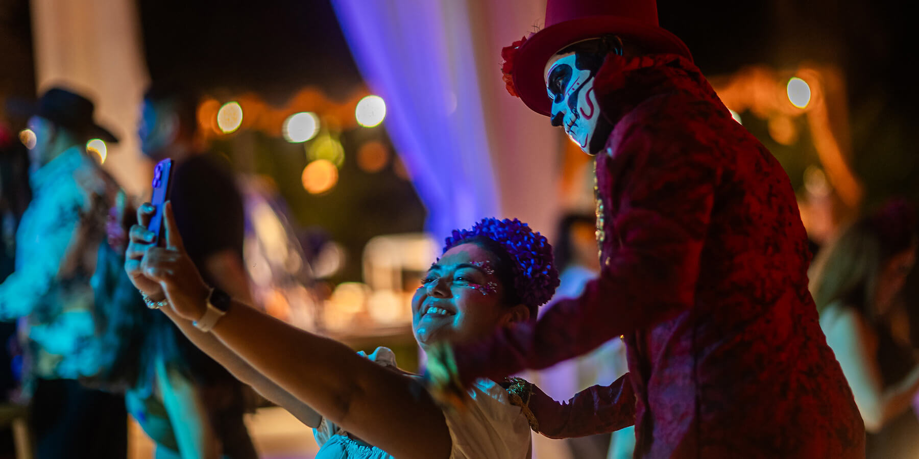 person takes selfie with catrina at mayakoba